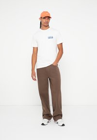 Rip Curl SPORTLINE TEE UNISEX - Camiseta estampada - bone