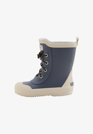 Granatowy gumowy kalosz z beżowymi akcentami, okrągłym noskiem, teksturowaną podeszwą i przednim sznurowaniem. Posiada pętlę do ściągania z tyłu.