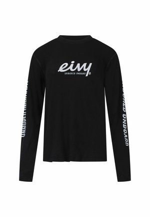 Schwarzes langärmliges T-Shirt aus Baumwolle mit einem großen weißen Grafiklogo auf der Vorderseite und Text entlang beider Ärmel. Rundhalsausschnitt, lockere Passform.