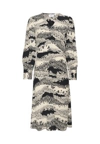 Kukallinen mekko vaaleassa beige- ja mustassa värissä, jossa on pitkät hihat, hieman levenevä helma ja V-mallinen kaula-aukko hienovaraisilla ryppy-yksityiskohdilla.