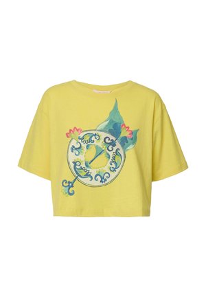 T-shirt jaune court en coton, avec un design graphique floral rond en bleu et rose avec des motifs détaillés. Manches courtes.