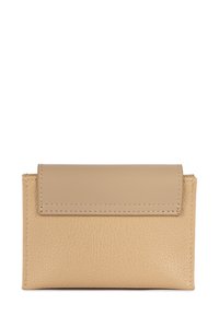 Beige leather cardholder with a smooth, flat top flap and textured body. Features visible stitching and a compact rectangular shape.