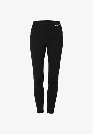 Schwarze Leggings mit einem hohen Bund, aus dehnbarem Material. Mit einem kleinen Logo am Bund und einer Seitennaht, die ein dezentes Designelement aufweist.