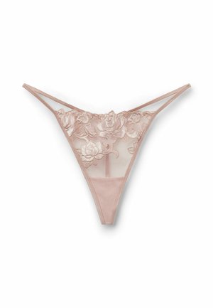 Tanga beige con bordado floral, detalles de malla transparente y tirantes finos. Tela suave con intrincados patrones de rosas en la parte frontal.