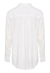 Camicia bianca a maniche lunghe con colletto classico, dettaglio sulla spalla e polsini con bottoni. Tessuto liscio e vestibilità comoda.