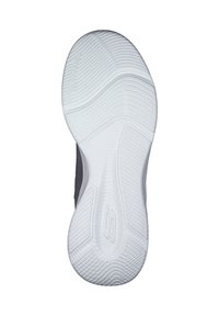 Suola della scarpa realizzata in materiale gomma bianca con motivi di grip testurizzati, linee morbide e un logo vicino al centro, progettata per la trazione.