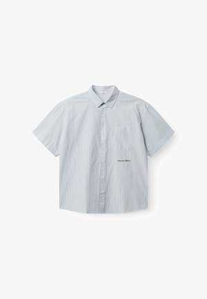 Short-sleeve button-up shirt in light blue with vertical stripes. Features a chest pocket and embroidered detail near the hem. Cotton material.