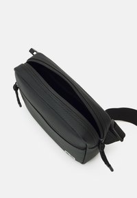 Lacoste REPORTER BAG UNISEX - Borsa a tracolla - noir