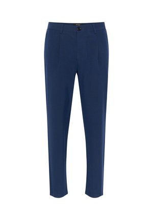 Pantalones azul marino con un diseño a medida, que cuentan con un cierre de botón y dos pliegues frontales. Textura suave y forma de pierna entallada.