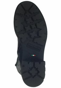Black boot sole with a textured tread pattern for grip. Features logos and markings, including "Made in Italy" and "Since '45."