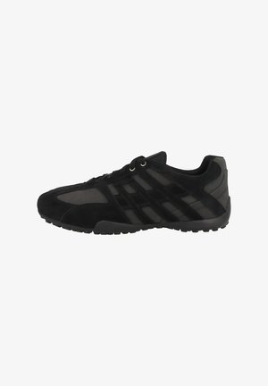 Black athletic shoe featuring a suede and mesh upper, lace-up design, and textured rubber sole with pattern accents.