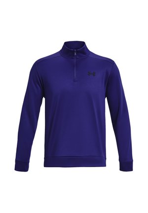 Paars langemouwig sweatshirt met een kwart-rits kraag, gemaakt van zachte stof, met een zwart logo op de borst en geribbelde manchetten.
