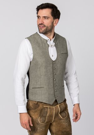 Gray linen vest with a rounded neckline, front buttons, and two small pockets. Worn over a white shirt with a traditional design.