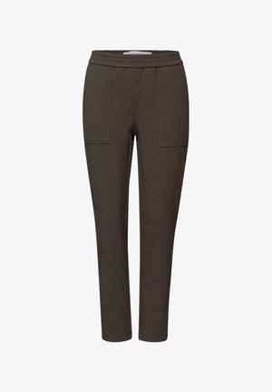 Braune, schmal geschnittene Strickhosen mit elastischem Bund und vorderen aufgesetzten Taschen, knöchellang.