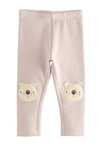 Svetloružové pruhované legíny z mäkkej tkaniny s chlpatými aplikáciami medvedíkov na kolenách. Elastický pás, dizajn dlhý až po členky.
