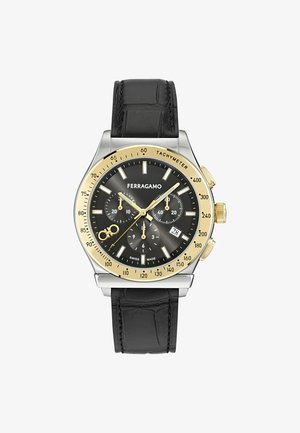 Ferragamo kronográf óra fekete számlappal, arany tachyméter lünettával, három segédszámlappal, dátumablakkal és fekete bőrszíjjal.