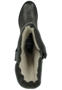 Bottine en cuir gris avec un bout arrondi, doublure beige douce, détail de fermeture éclair et bord supérieur festonné. Semelle basse, couture minimaliste.