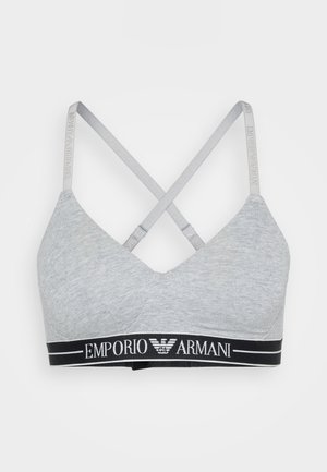 Bralette in cotone grigio con scollatura a V, dotata di una fascia nera con il logo "Emporio Armani" e spalline incrociate grigie.