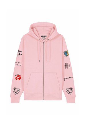 Gaiši rozā rāvējslēdzēja kapuce ar melniem un sarkaniem grafiskiem attēliem uz piedurknēm, tostarp raudošu sirdi, sauli un mēnesi, atzīmēm un sarkaniem lūpām.