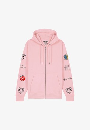 Gaiši rozā rāvējslēdzēja kapuce ar melniem un sarkaniem grafiskiem attēliem uz piedurknēm, tostarp raudošu sirdi, sauli un mēnesi, atzīmēm un sarkaniem lūpām.