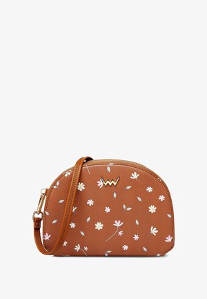 Brown synthetic crossbody bag with floral pattern in pink and white. Rounded shape, gold hardware, and adjustable strap. Zipper closure.
