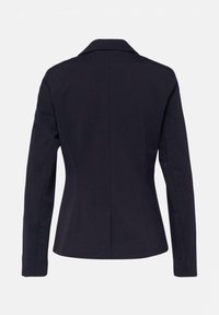 Schwarzer, enganliegender Blazer mit langen Ärmeln und einem figurbetonten Rückennaht-Design, präsentiert vor einem schlichten weißen Hintergrund.