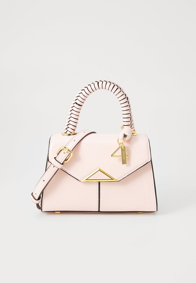 Pink leather handbag with a structured shape, black accents, gold hardware, and a decorative keychain. Features a spiral handle and an adjustable strap.