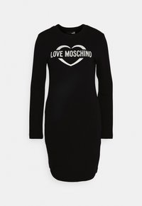 Svart långärmad figurformad klänning med "LOVE MOSCHINO"-text inuti en vit hjärtform på bröstet.