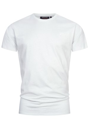 Camiseta blanca de manga corta hecha de algodón. Presenta un escote redondo y un pequeño logo sutil en el pecho. Textura suave en toda la prenda.