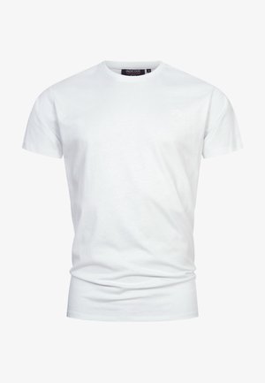 Fehér, rövid ujjú pamut póló. Kerek nyakú, és a mellkason egy apró, diszkrét logó található. Az anyag sima tapintású.