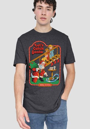 Santa carrying a sack approaches a cookie trap with children watching from a staircase; text reads "Let's Catch Santa" and "Holiday Activities."