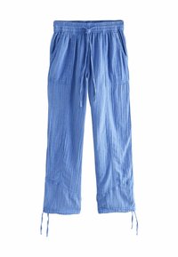 Pantalon bleu clair texturé en mélange de coton avec une taille élastique, un cordon de serrage et des poches latérales. Détail de liens noués à l'ourlet.