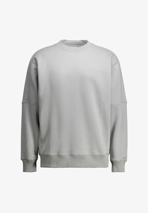 Lysegrå sweatshirt lavet af bomuldsblanding, med rund halsudskæring, ribstrikkede manchetter og en lille tekstlogo på fronten.