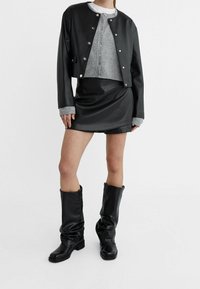 Stradivarius Jacka i konstläder - black