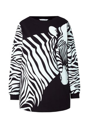 Sorte og hvide langærmede skjorte med et stort zebra-grafik, med et abstrakt mønster på den ene ærme og en solid sort krop.