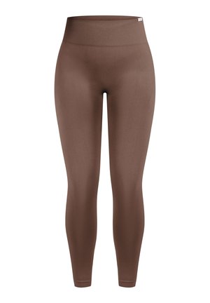 Brązowe legginsy z wysokim stanem o gładkiej, elastycznej fakturze. Bezszwowy krój dopasowujący się do ciała, odpowiedni do aktywności fizycznej lub codziennego użytku.