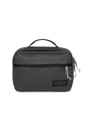 Gray zippered bag with a flat rectangular shape, fabric material, top handle, and a front pocket featuring a brand logo patch.