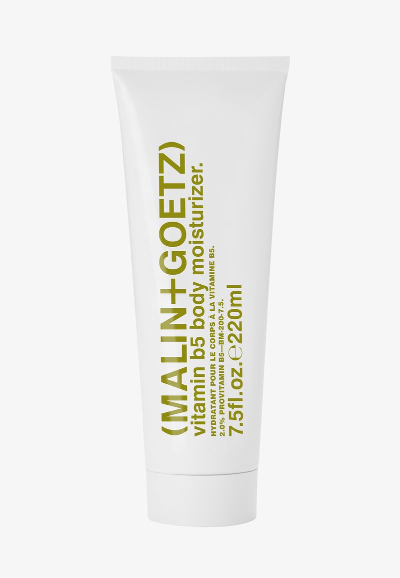 Weißes Plastikrohr mit Klappdeckel. Mit grünem Text "MALIN+GOETZ Vitamin B5 Körperfeuchtigkeitsspender" und einem Fassungsvermögen von 220 ml.