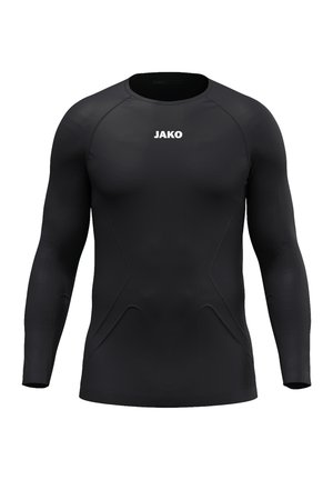Maglietta a compressione atletica nera a maniche lunghe con scollo tondo e logo bianco JAKO al centro del petto, mostrata su uno sfondo bianco semplice.