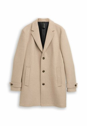 Beige wollen mix jas met een gesneden kraag, drie knopen, twee voorzakken en opgerolde manchetten. Gevoerde binnenzijde in het zwart.