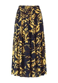 Jupe maxi fluide à plusieurs niveaux, en tissu bleu marine avec un motif abstrait de feuilles jaunes et noires ; ceinture élastique pour un ajustement réglable.