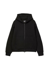 Sweat à capuche zippé noir avec poches avant, manches longues et capuche attachée, avec un logo discret de la marque sur la poitrine.