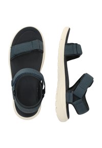 Sinikel blue fabric sandals with adjustable straps, textured upper, cushioning sole, and a white rubber outsole. Designed for comfort and support.