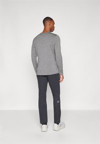 Berghaus RIDGE ROAMER - Hlače za otvoreno - black