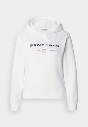 White hoodie made of soft cotton with a front pocket, featuring "GANT 1949" text and a shield logo. Ribbed cuffs and hem for fit.
