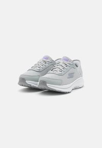 Gray athletic shoes with a mesh upper, textured overlays, lace-up closure, and white sole featuring cushioning technology.