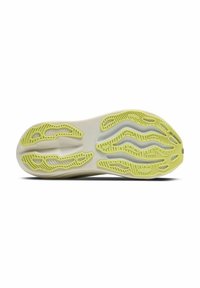 Semelle de chaussure avec une base blanche et un motif texturé jaune, conçue pour une adhérence et des performances optimales avec des découpes en ondulations.