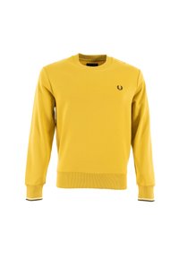 Sudadera de algodón amarilla con cuello redondo, puños y dobladillo acanalados. Presenta un pequeño logo negro en el pecho y rayas de acento verdes.