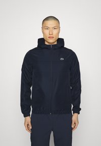 Lacoste Sport - SPORTS JACKET - Verryttelytakki - navy blue Pienoiskuva 1