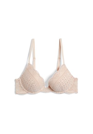 Soutien-gorge en dentelle beige avec bretelles réglables, armatures, et détails à motif floral sur les bonnets et la bande.